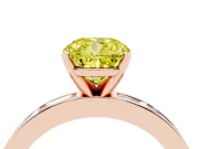 Fancy Yellow Cushion Cut Diamond Solitaire Ring Set in Rose gold with Channel-Set Baguette Band and Prong Setting