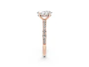 Oval Cut Diamond Pavé Band Ring Set in Rose gold with Prong-Set Center Stone