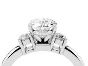 Three-Stone Oval Cut Diamond Ring Set in White gold with Prong Setting and Plain Band