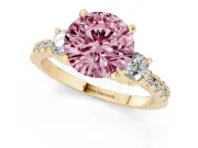 Fancy Pink Three-Stone Round Cut Diamond Pavé Band Ring Set in Yellow gold with Prong Setting