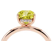 Fancy Yellow Cushion Cut Diamond Solitaire Ring Set in Rose gold with Thin Band and Prong Setting