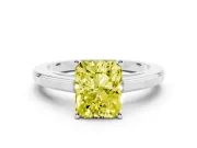 Fancy Yellow Radiant Cut Diamond Solitaire Ring Set in White gold with Prong Setting and Classic Band
