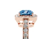 Fancy Blue Cushion Cut Diamond Halo Pavé Engagement Ring Set in Rose gold with Bezel Setting