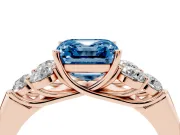Fancy Blue Asscher Cut Diamond Cluster Ring Set in Rose gold with Round Accent Stones and Prong Setting on a Plain Band