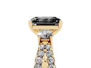 Fancy Black Emerald Cut Diamond Three-Stone Ring Set in Yellow gold with Pavé Split Shank and Prong Setting