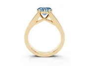 Fancy Blue Heart Cut Diamond Solitaire Ring Set in Yellow gold with Channel-Set Accent Stones and Prong Setting