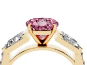 Fancy Pink Round Cut Diamond Engagement Ring Set in Yellow gold with Baguette Side Stones and Channel Set Band
