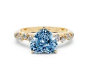 Fancy Blue Heart Cut Diamond Cluster Solitaire Ring Set in Yellow gold with Prong Setting