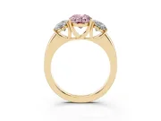 Fancy Pink Oval Cut Diamond Three-Stone Ring Set in Yellow gold with Bold Center and Classic Band