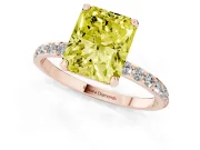 Fancy Yellow Radiant Cut Diamond Solitaire Ring Set in Rose gold with Round Pavé Band and Prong Setting