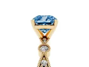 Fancy Blue Cushion Cut Diamond Solitaire Engagement Ring Set in Yellow gold with Milgrain Bezel Accent Band