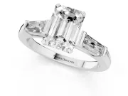 Emerald Cut Diamond Solitaire Ring Set in White gold with Tapered Baguette Side Stones and Prong Setting