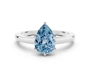 Fancy Blue Pear Cut Diamond Solitaire Engagement Ring Set in Platinum with Prong Setting on a Classic Band