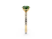 Fancy Green Round Cut Diamond Brilliant Solitaire Ring Set in Yellow gold with Pavé Band and Prong Setting