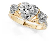 Heart Cut Diamond Three-Stone Ring Set in Yellow gold with Pavé Band
