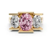 Fancy Pink Oval Cut Diamond Three-Stone Channel Set Ring Set in Yellow gold with Smooth Polished Band