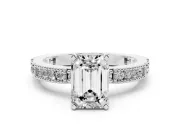 Emerald Cut Diamond Solitaire Ring Set in Platinum with Slim Pavé Band and Prong Setting