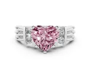 Fancy Pink Three-Stone Heart Cut Diamond Channel Set Ring Set in White gold with Bar Prongs