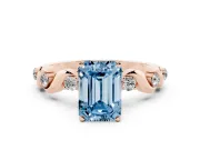 Fancy Blue Emerald Cut Diamond Solitaire Ring Set in Rose gold with Ribbon Twist Band, Round Accents and Prong Setting