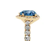 Fancy Blue Heart Cut Diamond Halo Engagement Ring Set in Yellow gold with Pavé Band and Prong Setting
