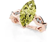Fancy Yellow Marquise Cut Diamond Twist Band Solitaire Ring Set in Rose gold with Leaf Prong Setting and Accent Stones