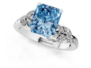 Fancy Blue Radiant Cut Diamond Solitaire Ring Set in Platinum with Marquise Twist Band and Prong Setting