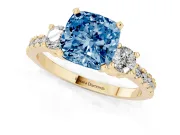 Fancy Blue Three-Stone Cushion Cut Diamond Pavé Band Ring Set in Yellow gold with Prong Setting