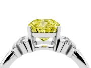 Fancy Yellow Three-Stone Cushion Cut Diamond Channel Set Ring Set in White gold with Bar Prongs