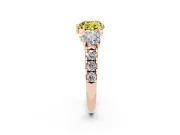 Fancy Yellow Heart Cut Diamond Three-Stone Ring Set in Rose gold with Pavé Band