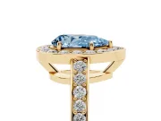 Fancy Blue Pear Cut Diamond Halo Pavé Engagement Ring Set in Yellow gold with Bezel Setting