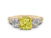 Fancy Yellow Cushion Cut Diamond Three-Stone Ring Set in Yellow gold with Round Side Stones and Pavé Band