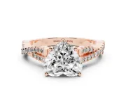 Heart Cut Diamond Solitaire Engagement Ring Set in Rose gold with Twisted Pavé Band and Prong Setting
