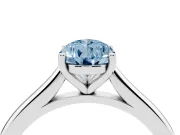 Fancy Blue Pear Cut Diamond Solitaire Ring Set in White gold with Cathedral Band and Prong Setting