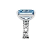Fancy Blue Emerald Cut Diamond Solitaire Set in White gold with Round Pavé Band and Prong Setting