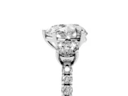 Heart Cut Diamond Three-Stone Ring Set in Silver with Pavé Band and Graduated Sides