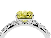 Fancy Yellow Radiant Cut Diamond Cluster Solitaire Ring Set in White gold with Prong Setting