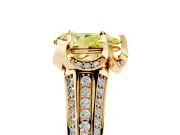 Fancy Yellow Pear Cut Diamond Pavé Split Shank Solitaire Ring Set in Yellow gold with Prong Setting