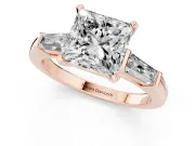 Princess Cut Diamond Solitaire Ring Set in Rose gold with Tapered Baguette Side Stones and Prong Setting