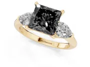Fancy Black Three-Stone Princess Cut Diamond Ring Set in Yellow gold with Pear Side Stones and Prong Setting
