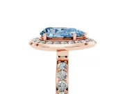 Fancy Blue Pear Cut Diamond Halo Ring Set in Rose gold with Bezel Frame and Pavé Band