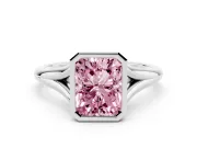 Fancy Pink Bezel Set Radiant Cut Diamond Solitaire Ring Set in White gold with Tapered Band
