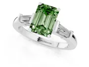 Fancy Green Emerald Cut Diamond Solitaire Ring Set in Silver with Tapered Baguette Accents and Prong Setting