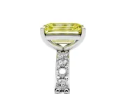 Fancy Yellow Emerald Cut Diamond Solitaire Set in Silver with Round Pavé Band and Prong Setting