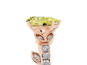 Fancy Yellow Pear Cut Diamond Solitaire Leaf-Inspired Ring Set in Rose gold with Pavé Band and Prong Setting