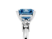 Fancy Blue Three-Stone Asscher Cut Diamond Ring Set in White gold with Prong Setting and Plain Band