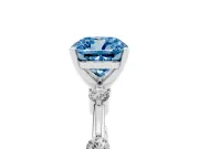 Fancy Blue Cushion Cut Diamond Solitaire Ring Set in Platinum with Bezel Set Side Stones and Prong Setting