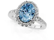 Fancy Blue Oval Cut Diamond Halo Pavé Solitaire Ring Set in Silver with Prong-Set Center Stone
