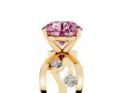 Fancy Pink Round Cut Diamond Solitaire Ring Set in Yellow gold with Side Stones on Criss-Cross Band and Prong Setting