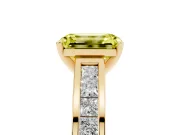 Fancy Yellow Emerald Cut Diamond Solitaire Ring Set in Yellow gold with Channel-Set Band and Prong Setting
