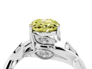 Fancy Yellow Oval Cut Diamond Solitaire Twist Engagement Ring Set in Silver with Pavé Leaf Accents